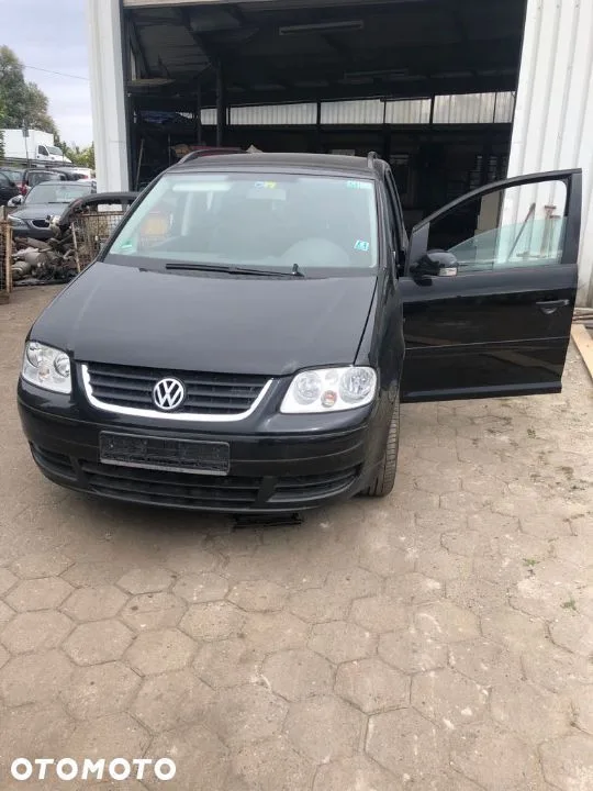 VW TOURAN SILNICZEK WYCIERACZEK LEWY EUROPA